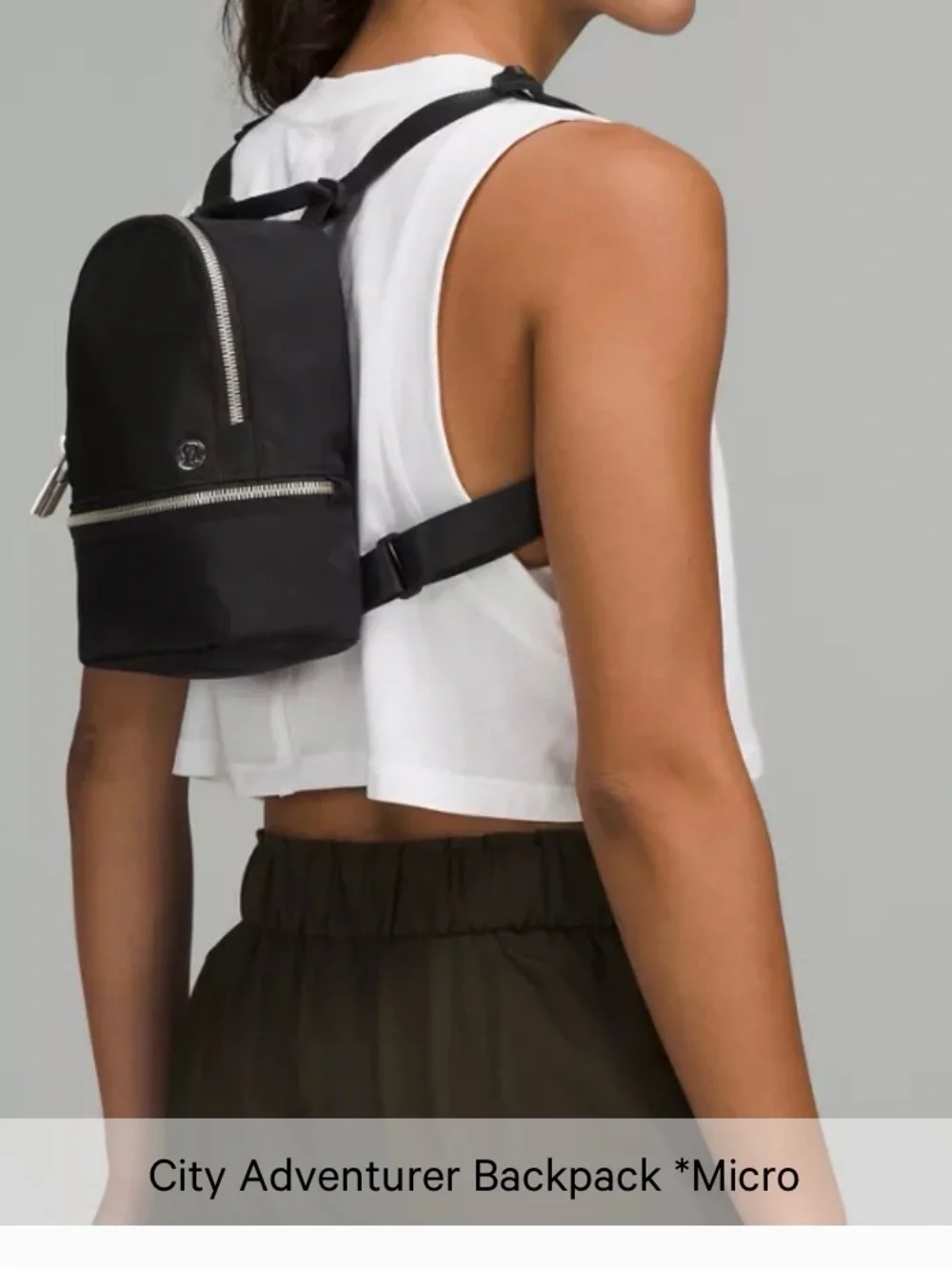 Lululemon City Adventurer Backpack Micro 3L in Black with Gold hardware.
